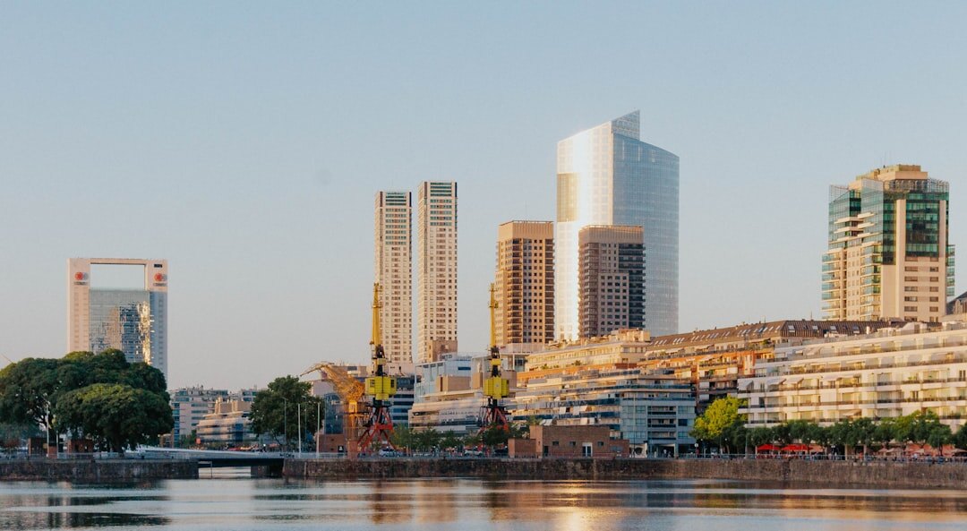 Buenos Aires skyline reflected in the river at dusk